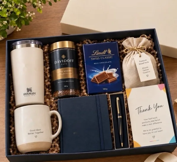 Thank-you box with tumbler, mug, coffee, chocolate, diary and pen