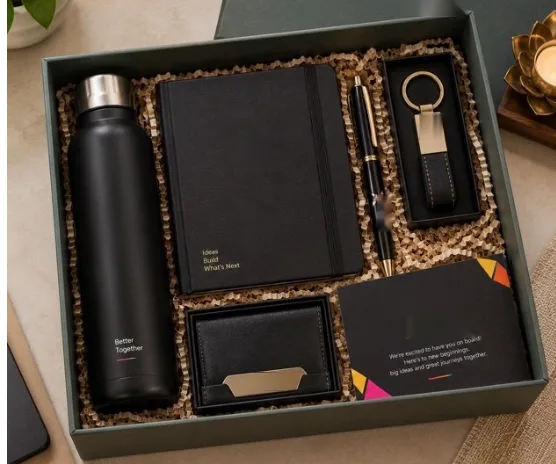 Welcome kit with bottle, notebook, pen, keychain and card holder